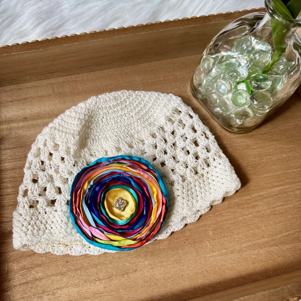 White‎ Crochet Baby Hat With Multicolor Satin Flower Appliqué